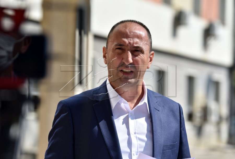 The court sets the hearing for Minister Liburn Aliu