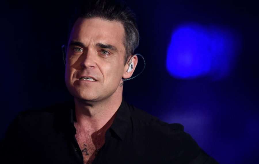 Robbie Williams është kërcënuar me heqje koke në Haiti