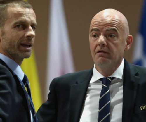 Përplasje FIFA-UEFA, Infantino përballet me kërcënim ligjor