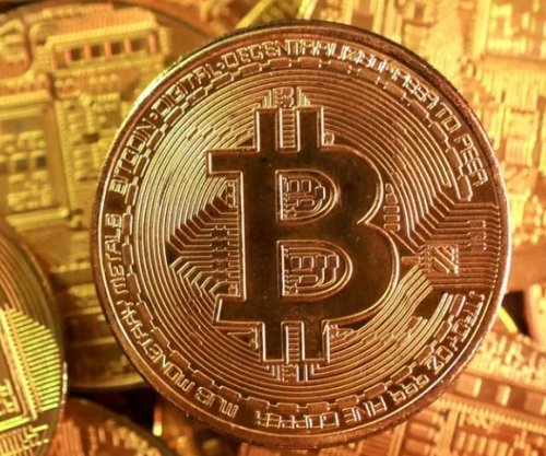 Bitcoini bie nën 60 mijë dollarë mes presionit në tregjet globale