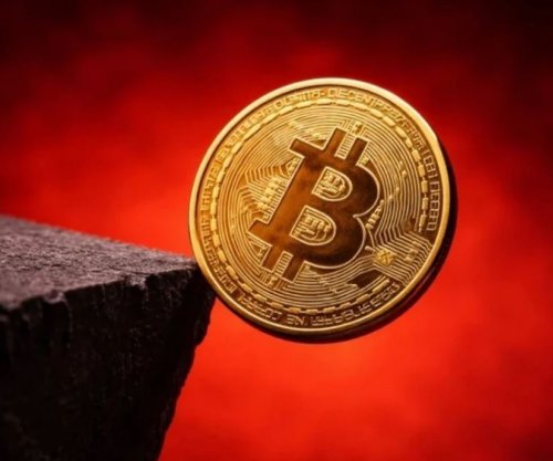 Bitcoini bie nën 60 mijë dollarë
