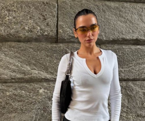 Dua Lipa shfaqet elegante në Milano, ndan fotografi me ndjekësit
